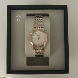 Bulova Women’s Watch, with diamonds on face! Never worn, brand new